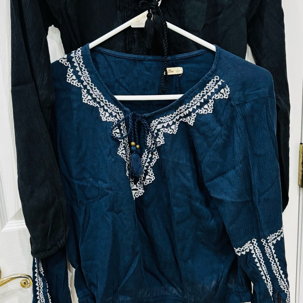 2 Hollister 1 Navy & 1 Black Blouses with White Embroidery Size S & XS